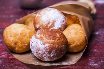 Fototapeta premium cheese donuts with powdered sugar