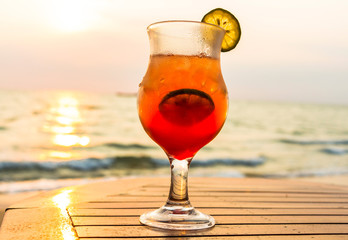Cocktail on the beach at sunset