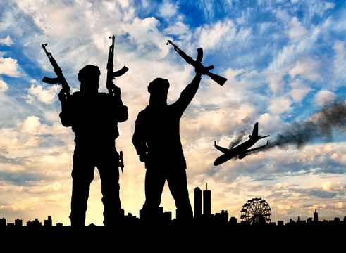 Silhouette of armed men and plane crashing into a city