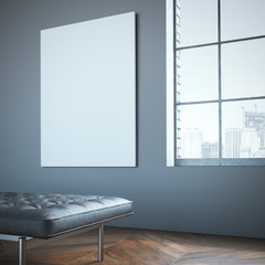 Blank white canvas in the gallery with leather chaise-longue.
