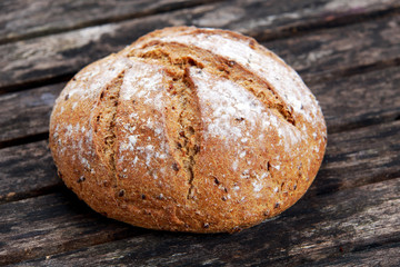 Fresh Home made Bread on old wooden table