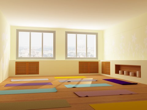 Light Yoga studio with yoga carpets on hardwood floor