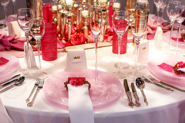 Elegant table set in soft pink for wedding 
