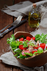 Salad with chicken, tomato cherry and onion