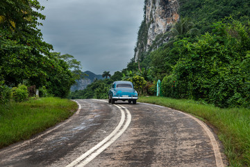 American oldtimer drive on Cuban road