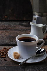 Cup of coffee and coffee beans
