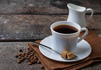 Cup of coffee and coffee beans