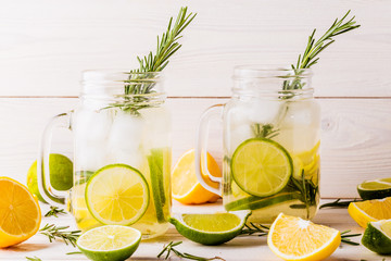 Homemade lemonade with lime, lemon, rosemary.