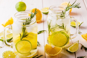 Homemade lemonade with lime, lemon, rosemary.