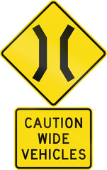 Road sign assembly in New Zealand - Caution wide vehicles