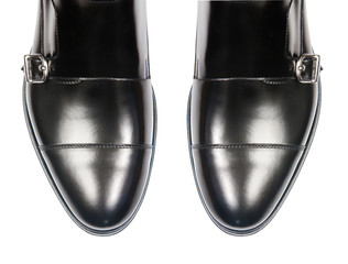 Tip of male shoes isolated on white