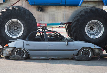 Monster truck wrecked car on road © Zsolt Biczó