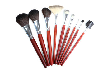 Makeup brushes set on a white background