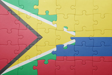 puzzle with the national flag of colombia and guyana