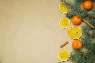 Christmas composition with mandarine orange and dried orange slices 