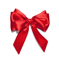 Red ribbon with bow on white