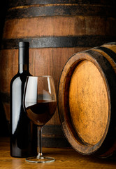 red wine glass and bottle