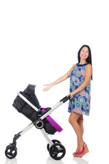 Happy mom with her baby in pram 