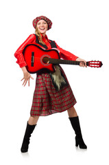 Funny woman in scottish clothing with guitar