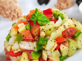 Tunisian salad with tomatos, cucumbers and tuna
