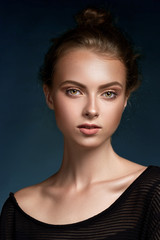Fototapeta premium Beauty woman face closeup isolated on black background. Beautifu