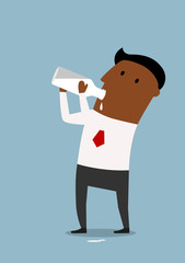 Businessman drinking milk from bottle