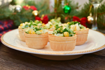 Holiday tartlets with salad of avocado