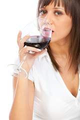 Young woman drinking red wine