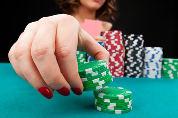 Young woman with gambling chips