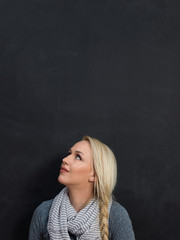 Fototapeta premium smiling student or teacher at the blackboard