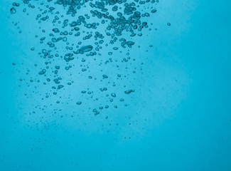 Water wave transparent surface with bubbles over white backgroun