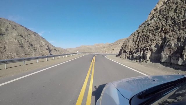 The famous Route 40 paved road parallel to the Andes against a blue sky and going towards the Ischigualasto National Park, San Juan Province. Argentina 2014