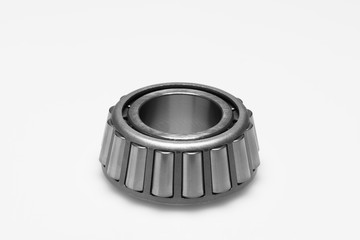 Steel ball bearing on white background.
