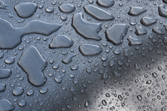 Water Drops on Curved Metal