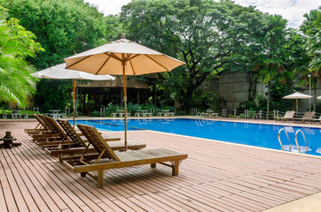 sunbed beside a swimming pool