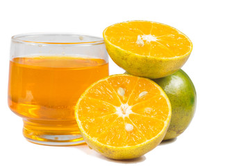 Orange juice and slices of orange isolated on white
