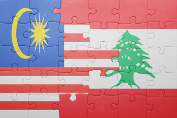 puzzle with the national flag of lebanon and malaysia