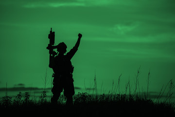 Silhouette of soldier with rifle..