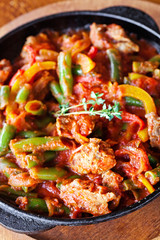 Roasted asparagus with beef and others vegetables in the pan