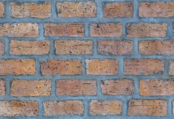 Obraz premium Seamless old brown brick wall background