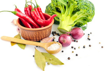 Vegetables and spices on a white background