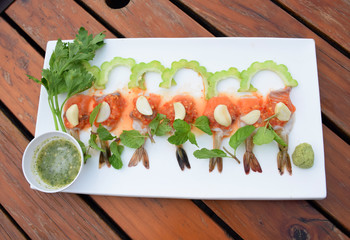 shrimp and salmon with spicy salad