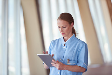 female doctor with tablet computer