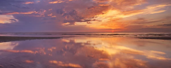 Foto op Canvas Sunset reflections on the beach, Texel island, The Netherlands © sara_winter