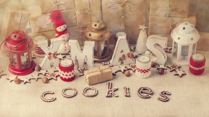 Christmas card. Christmas decorations - letters XMAS, gifts, coo