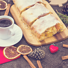 .Strudel with custard and orange. Christmas Stollen. Christmas table decoration.