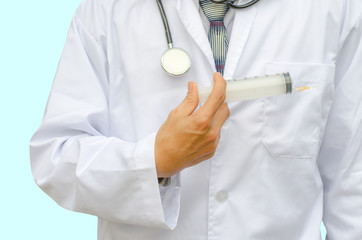 doctor holding a syringe