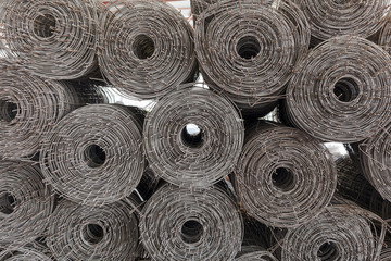 Rolls of wire mesh placed them in storage awaiting disposal.