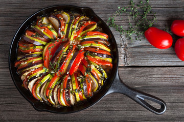 Vegetable ratatouille baked in cast iron frying pan traditional homemade healthy diet french...