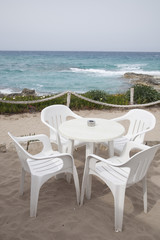 Fototapeta na wymiar Cafe Table and Chairs, Formentera, Balearic Islands